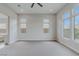Spacious bedroom with plush carpet, lots of natural light from the many windows at 11173 Concord Valley Dr, Las Vegas, NV 89135