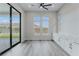 Bright dining room boasts natural light, sliding glass doors, stylish white cabinets, and quartz countertops at 11173 Concord Valley Dr, Las Vegas, NV 89135