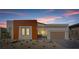 Well-maintained home exterior with manicured landscaping and a private driveway at 11173 Concord Valley Dr, Las Vegas, NV 89135