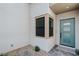 Exterior of home with a decorative door and windows at 11173 Concord Valley Dr, Las Vegas, NV 89135