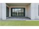 This covered patio features seamless indoor-outdoor living with mountain views and concrete pavers at 11173 Concord Valley Dr, Las Vegas, NV 89135