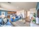Open-concept living room flowing into the kitchen, featuring stylish furnishings and decor at 1201 Dre Harbor Pl # Lot 80, North Las Vegas, NV 89084