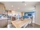 Open-concept floor plan, blending the living room, dining area, and kitchen seamlessly at 1201 Dre Harbor Pl # Lot 80, North Las Vegas, NV 89084
