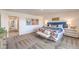 Bright main bedroom suite with neutral carpeting, large windows, and stylish decor at 1201 Dre Harbor Pl # Lot 80, North Las Vegas, NV 89084