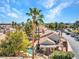 Overhead of a charming property with a lush backyard, rock pool, and mature trees in a serene setting at 125 Firecreek Cir, Las Vegas, NV 89107