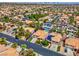 Beautiful aerial view of the home showcasing the neighborhood with manicured landscaping and mature trees at 1312 Fragrant Spruce Ave, Las Vegas, NV 89123