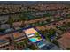 Stunning aerial view showcasing the pool, landscaping, and surrounding neighborhood at 1312 Fragrant Spruce Ave, Las Vegas, NV 89123