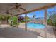 View of the backyard featuring an in-ground pool, landscaping, and covered patio area at 1312 Fragrant Spruce Ave, Las Vegas, NV 89123