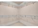 Walk-in closet featuring built-in shelving at 1312 Fragrant Spruce Ave, Las Vegas, NV 89123