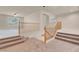 Upstairs landing with carpeted stairs, and open access to other rooms at 1312 Fragrant Spruce Ave, Las Vegas, NV 89123