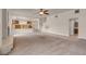 Open living room with fireplace and staircase leading up to the second level at 1312 Fragrant Spruce Ave, Las Vegas, NV 89123