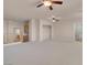 Upstairs living room featuring a ceiling fan, and open access to other rooms at 1312 Fragrant Spruce Ave, Las Vegas, NV 89123
