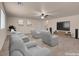 Media room with reclining seats and a large TV at 1312 Fragrant Spruce Ave, Las Vegas, NV 89123