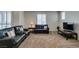 Cozy living room with plush carpet and ample seating at 1370 Crystal Hill Ln # 3, Henderson, NV 89012