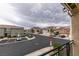 Street view from balcony showcases the neighborhood, street, and nearby parking at 1370 Crystal Hill Ln # 3, Henderson, NV 89012