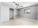 Bright bedroom features a large closet and a modern ceiling fan at 1415 Helen Ave, North Las Vegas, NV 89030