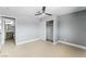 Bright bedroom featuring wood-look floors and an ensuite bathroom at 1415 Helen Ave, North Las Vegas, NV 89030