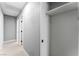 Hallway with closet storage, neutral paint and new flooring throughout at 1415 Helen Ave, North Las Vegas, NV 89030