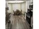 Eat-in kitchen with stainless steel appliances and plantation shutters at 1502 Cliff Branch Dr, Henderson, NV 89014