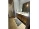 The bathroom features double sinks and a tiled floor at 1511 Cardinal Peak Ln # 201, Las Vegas, NV 89144