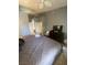 This bedroom offers neutral paint tones and modern furnishings at 1511 Cardinal Peak Ln # 201, Las Vegas, NV 89144