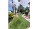 Beautifully landscaped front yard with green grass and a stone walkway at 1511 Cardinal Peak Ln # 201, Las Vegas, NV 89144