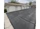 Exterior view of row of one car garages with white doors at 1511 Cardinal Peak Ln # 201, Las Vegas, NV 89144