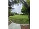 Green space with lots of green grass and condo buildings in the background at 1511 Cardinal Peak Ln # 201, Las Vegas, NV 89144