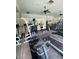 Community gym featuring weight machines, treadmills, stationary bikes, and mirrored walls at 1511 Cardinal Peak Ln # 201, Las Vegas, NV 89144