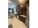 Modern kitchen features stainless steel appliances and granite countertops at 1511 Cardinal Peak Ln # 201, Las Vegas, NV 89144