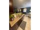 Modern kitchen features stainless steel appliances and granite countertops at 1511 Cardinal Peak Ln # 201, Las Vegas, NV 89144