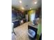 Spacious kitchen featuring stainless appliances, granite countertops, and ample cabinet space at 1511 Cardinal Peak Ln # 201, Las Vegas, NV 89144