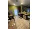 Modern kitchen features stainless steel appliances and granite countertops at 1511 Cardinal Peak Ln # 201, Las Vegas, NV 89144