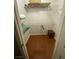 Bright walk-in closet featuring wire shelving and wood-style flooring at 1511 Cardinal Peak Ln # 201, Las Vegas, NV 89144