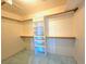 Walk-in closet features shelving and ample storage space at 1628 Palmae Way, Las Vegas, NV 89128
