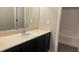 Well-lit bathroom with extended vanity and tub and shower combo, finished with neutral color palette at 1777 Gentle Brook St, North Las Vegas, NV 89084