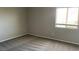 A vacant carpeted bedroom gets great natural light from a window with blinds at 1777 Gentle Brook St, North Las Vegas, NV 89084