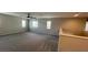 Large upstairs bonus room featuring carpet flooring, multiple windows, and neutral walls at 1777 Gentle Brook St, North Las Vegas, NV 89084