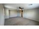 Spacious carpeted bonus room with recessed lighting and plenty of space for entertaining at 1777 Gentle Brook St, North Las Vegas, NV 89084