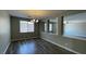 The dining room features new floors, windows for light, and a modern chandelier at 1777 Gentle Brook St, North Las Vegas, NV 89084