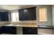 Spacious kitchen featuring granite countertops and a stainless steel dishwasher at 1777 Gentle Brook St, North Las Vegas, NV 89084