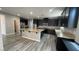 Spacious kitchen featuring stainless steel appliances, granite counters, and a large center island at 1777 Gentle Brook St, North Las Vegas, NV 89084