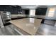 Spacious kitchen featuring stainless steel appliances, granite counters, and a large center island at 1777 Gentle Brook St, North Las Vegas, NV 89084