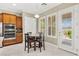 Breakfast nook with plantation shutters and access to back patio at 2 Lago Turchino Ct, Henderson, NV 89011