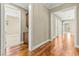 Inviting hallway features hardwood floors, recessed lighting, and seamless flow to other rooms at 2 Lago Turchino Ct, Henderson, NV 89011