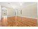 Bright living room boasts wood floors, recessed lighting, and entryways to other rooms at 2 Lago Turchino Ct, Henderson, NV 89011