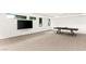 Spacious basement featuring a ping pong table, large tv, and lots of natural light at 21 Highland Cove Ln, Henderson, NV 89011
