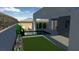 Rendering of a modern pool with lounge chairs, landscaping, and privacy wall at 21 Highland Cove Ln, Henderson, NV 89011
