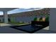 Rendering of a modern pool with a sleek design, stone wall and desert landscaping at 21 Highland Cove Ln, Henderson, NV 89011