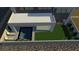 Rendering of a modern backyard pool with lounge chairs and manicured lawn at 21 Highland Cove Ln, Henderson, NV 89011